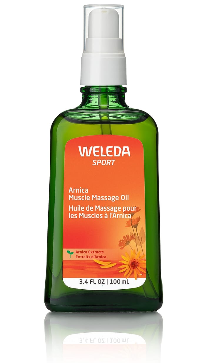 massaggio muscolare di olio di arnica weleda cura della pelle naturale - weleda